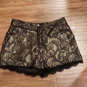 Super cute gold and black shorts size 2